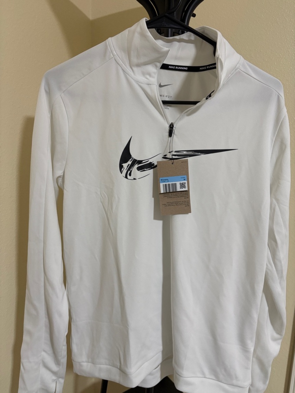 Nike White Quarter-Zip Pullover with Black Swoosh Graphic